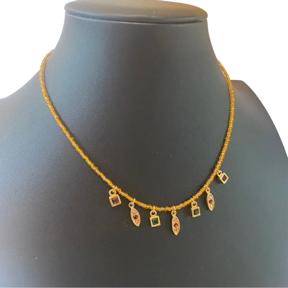 Anne Klein Jeweled Necklace on Gold Toned Beaded Chain.
